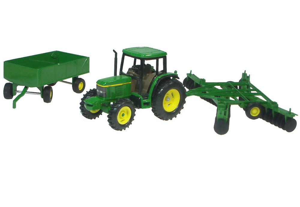 John Deere 6410 tractor, trailer and disc set