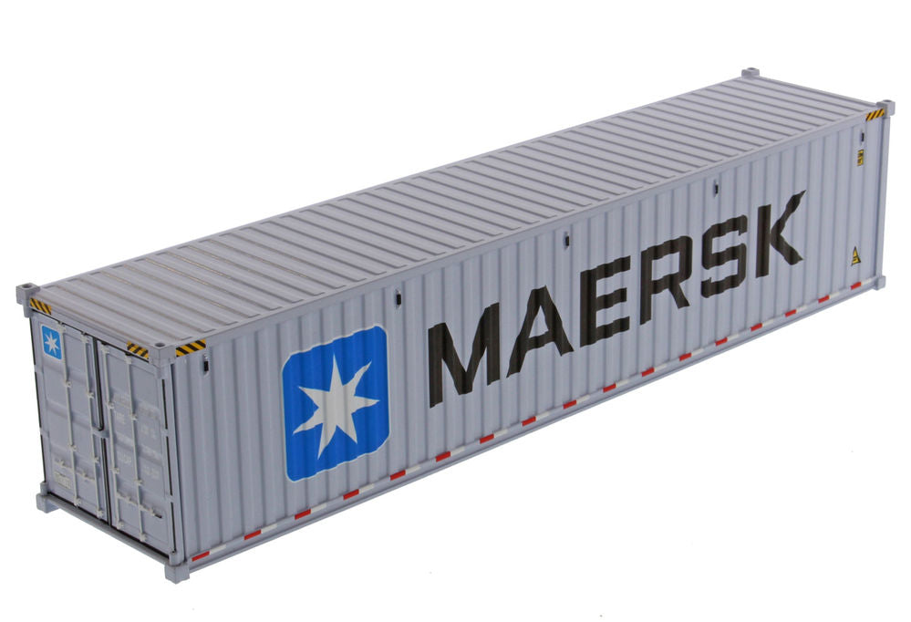 A miniature model of a gray shipping container with 'MAERSK' printed in black and the company's blue star logo, shown on a plain white background.