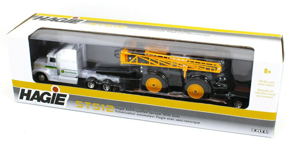 Hagie STS12 with semi lowboy