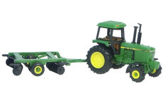 JOHN DEERE 4455 MFWD TRACTOR with DISC