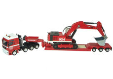 MAN LOW LOADER TRUCK with EXCAVATOR