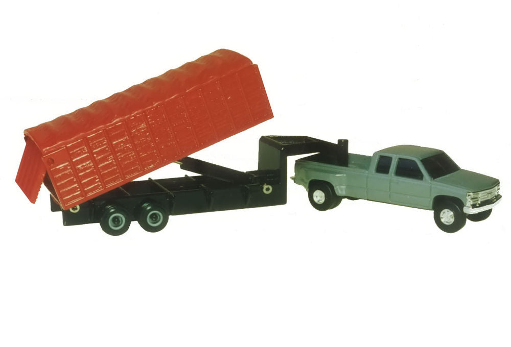Chevrolet dually pick-up with tipping grain trailer