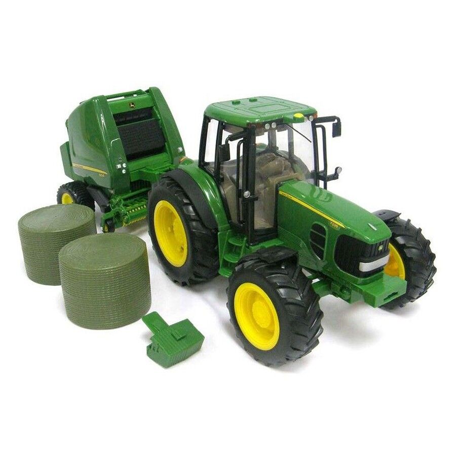 John Deere John Deere 7330 tractor with baler