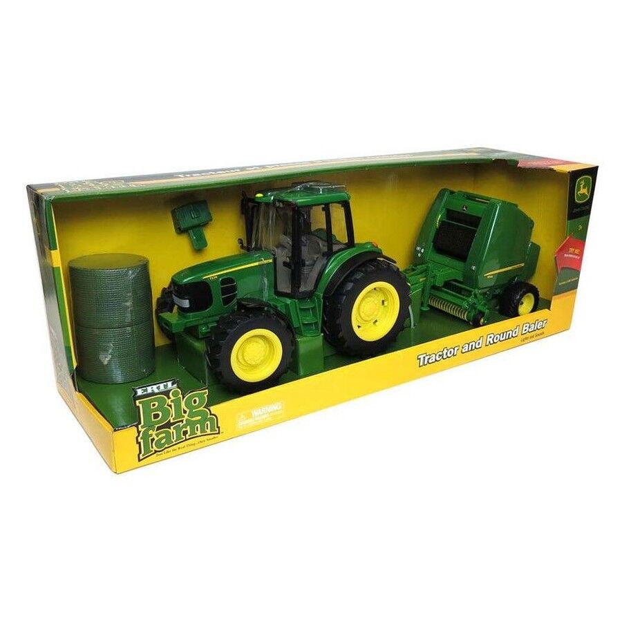 John Deere John Deere 7330 tractor with baler