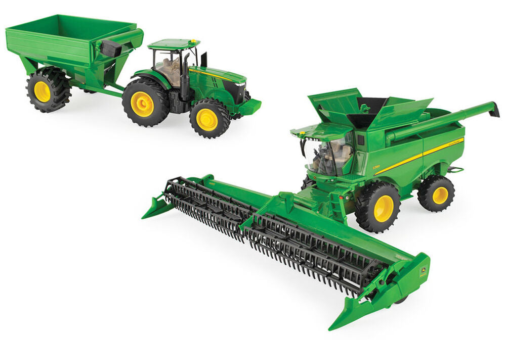 John Deere S780 header with 7290R tractor & chaser bin