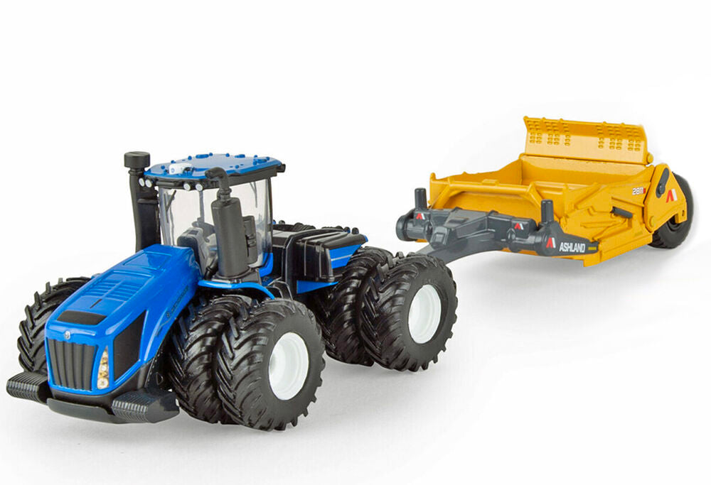 New Holland T9.700 4WD tractor on duals with ashland trailing scraper