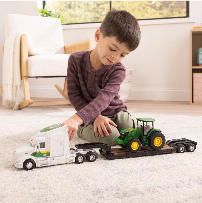 Peterbilt lowboy with John Deere 7290R tractor