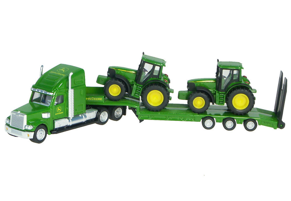 Peterbilt semi low loader with 2 jd 6920 tractors