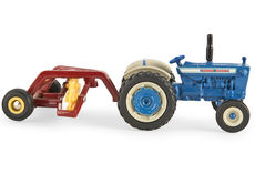 5000 TRACTOR with NEW HOLLAND ROLLER BAR HAY RAKE